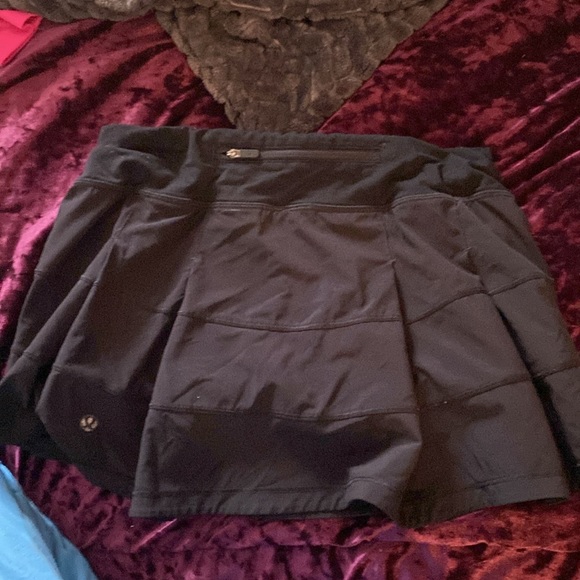 lululemon athletica Dresses & Skirts - black size 4 lululemon skirt (in perfect condition besides the logo) $10